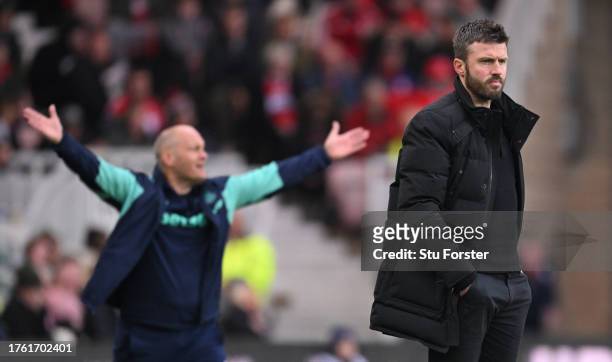 Middlesbrough Head Coach Michael Carrick looks on as Stoke City Manager Alex Neil reacts on the sidelines during the Sky Bet Championship match...