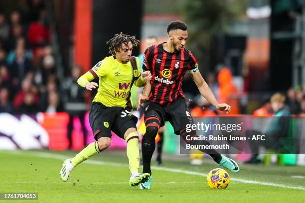 Luca Koleosho of Burnley closes down Lloyd Kelly of Bournemouth during the Premier League match between AFC Bournemouth and Burnley FC at Vitality...