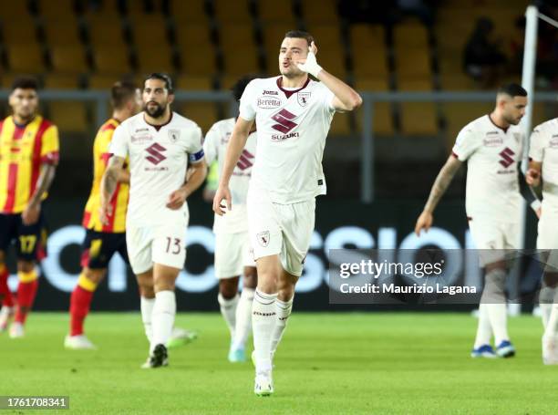 Alessandro Buongiorno of Torino celebrates after scoring his team's first goal during the Serie A TIM match between US Lecce and Torino FC at Stadio...