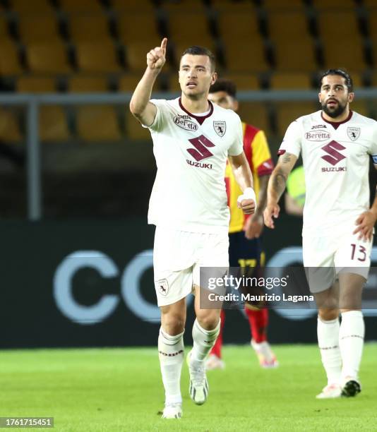 Alessandro Buongiorno of Torino celebrates after scoring his team's first goal during the Serie A TIM match between US Lecce and Torino FC at Stadio...