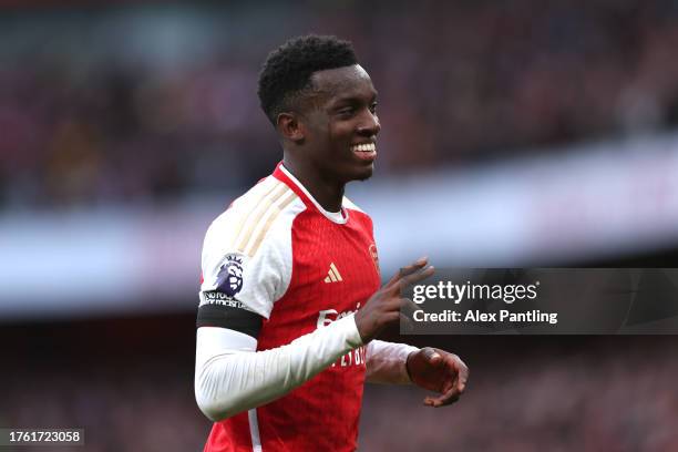 Eddie Nketiah of Arsenal celebrates after scoring the team's third and his hat-trick goal during the Premier League match between Arsenal FC and...