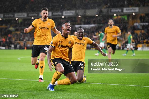 Mario Lemina of Wolverhampton Wanderers celebrates after scoring the team's first goal during the Premier League match between Wolverhampton...