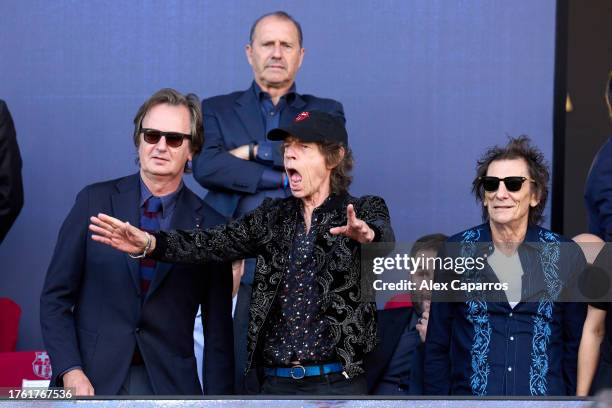 Mick Jagger and Ronnie Wood of the Rolling Stones are seen in attendance as FC Barcelona debut their limited edition match shirt featuring the...