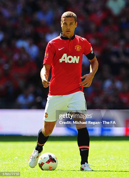 Nemanja Vidic of Manchester United in action during the FA Community Shield match between Manchester United and Wigan Athletic at Wembley Stadium on...