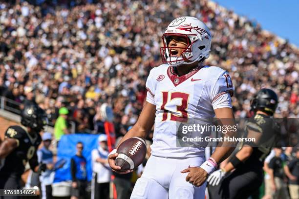 Jordan Travis of the Florida State Seminoles reacts after runing for a touchdown against the Wake Forest Demon Deacons during the first half of their...