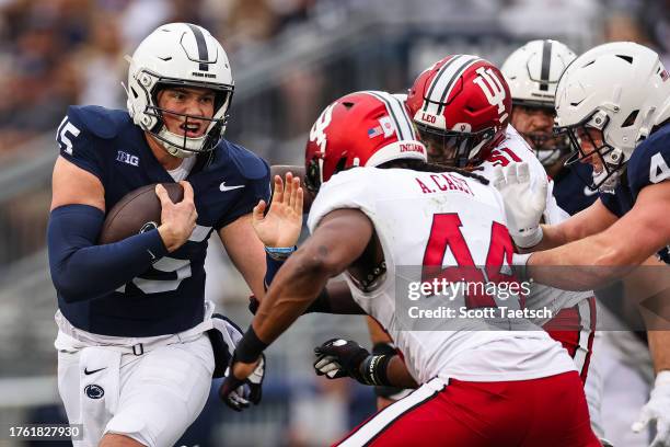 Drew Allar of the Penn State Nittany Lions scrambles against the Indiana Hoosiers during the first half at Beaver Stadium on October 28, 2023 in...