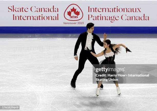 Shiyue Wang and Xinyu Liu of China perform in the Ice Dance Rhythm Dance during the ISU Grand Prix of Figure Skating - Skate Canada International at...