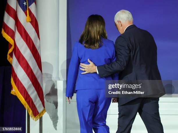 Karen Pence and former U.S. Vice President Mike Pence leave the stage after he suspended his campaign for president during the Republican Jewish...