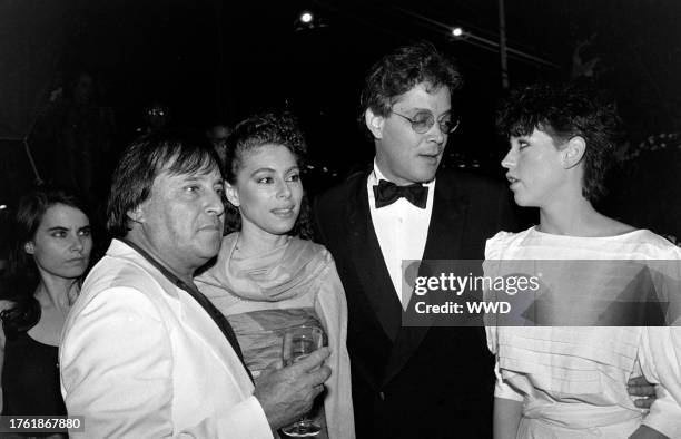 , Guest, Paul Mazursky, Merel Poloway, Raul Julia, and Molly Ringwald attend a party aboard the "Peking," docked at New York City's South Street...
