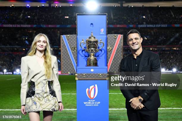 The Webb Ellis Cup arrives in the Louis Vuitton trunk, as Sophie Turner and Dan Carter pose for a photo prior to kick-off ahead of the Rugby World...