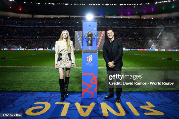 The Webb Ellis Cup arrives in the Louis Vuitton trunk, as Sophie Turner and Dan Carter pose for a photo prior to kick-off ahead of the Rugby World...