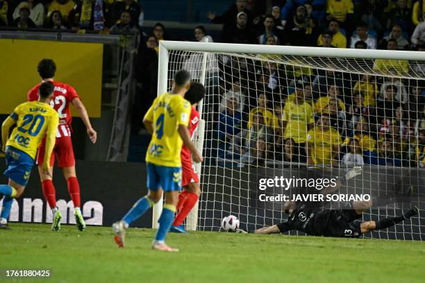 Las Palmas' Spanish midfielder Kirian Rodriguez scores the opening goal during the Spanish league football match between UD Las Palmas and Club...