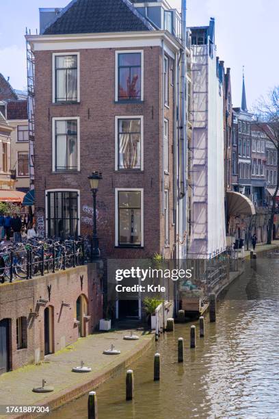 typical dutch canal house in the center of the city - grachtenpand stock pictures, royalty-free photos & images