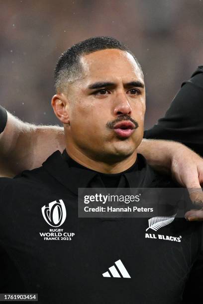 Aaron Smith of New Zealand reacts as the team sing their national anthem prior to the Rugby World Cup Final match between New Zealand and South...