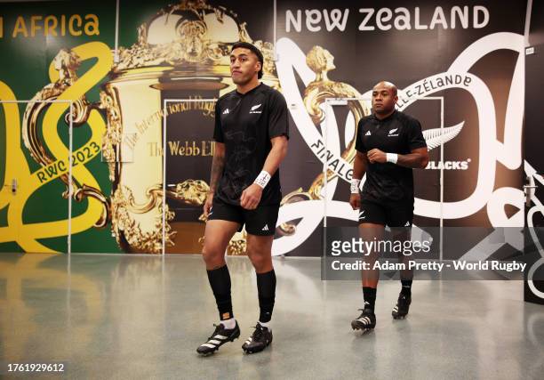 Rieko Ioane and Mark Telea of New Zealand walk through the players tunnel ahead of the warm up prior to the Rugby World Cup Final match between New...