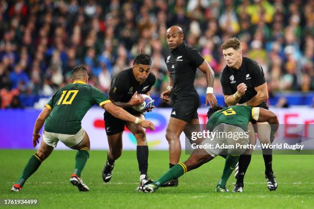 Rieko Ioane of New Zealand is tackled by Handre Pollard of South Africa during the Rugby World Cup Final match between New Zealand and South Africa...