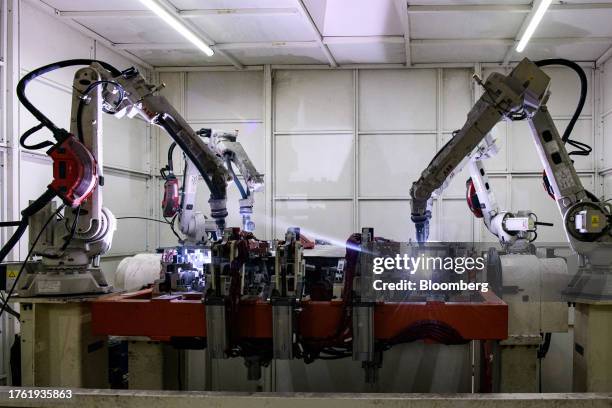 Robotic arms used for welding operate at the Linamar Corp. Of Canada EV battery case manufacturing facility in Muscle Shoals, Alabama, US, on...