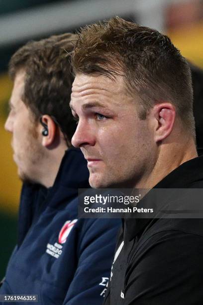 Sam Cane of New Zealand reacts from the bench after having his yellow card upgraded to a red card during the Rugby World Cup Final match between New...