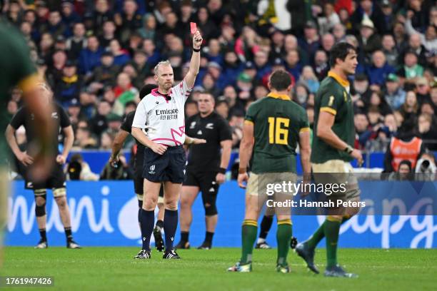 Referee Wayne Barnes upgrades Sam Cane of New Zealand's yellow card to a red card during the Rugby World Cup Final match between New Zealand and...