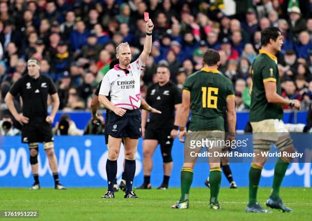Sam Cane of New Zealand is shown a Red Card by Referee Wayne Barnes, after the 8-Minute TMO Bunker Review escalates the initial Yellow Card decision...