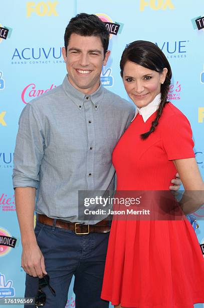 Actor Max Greenfield and wife Tess Sanchez attend the Teen Choice Awards 2013 at Gibson Amphitheatre on August 11, 2013 in Universal City, California.