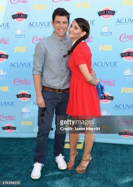 Actor Max Greenfield and wife Tess Sanchez attend the Teen Choice Awards 2013 at Gibson Amphitheatre on August 11, 2013 in Universal City, California.