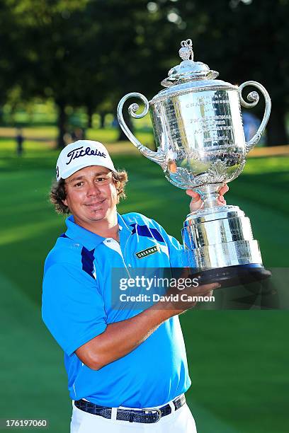 Jason Dufner of the United States poses with the Wanamaker Trophy after his two-stroke victory at the 95th PGA Championship at Oak Hill Country Club...