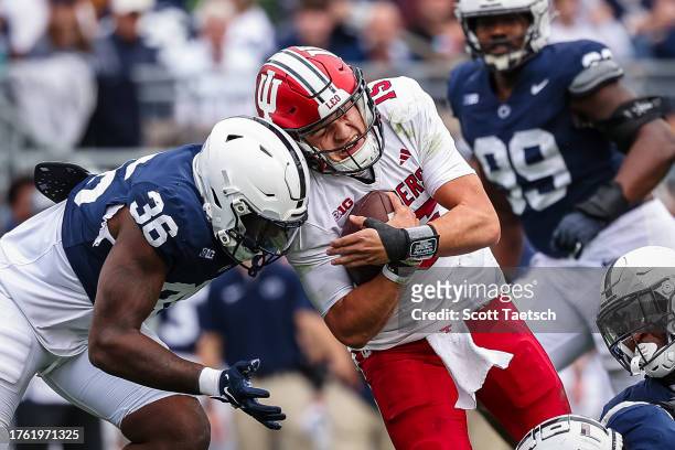 Zuriah Fisher of the Penn State Nittany Lions hits Brendan Sorsby of the Indiana Hoosiers during the second half at Beaver Stadium on October 28,...
