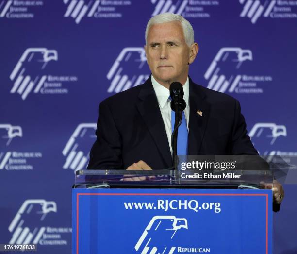 Republican presidential candidate former U.S. Vice President Mike Pence speaks after suspending his campaign for president during the Republican...