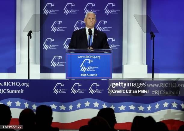 Republican presidential candidate former U.S. Vice President Mike Pence speaks after suspending his campaign for president during the Republican...