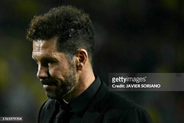 Atletico Madrid's Argentinian coach Diego Simeone reacts at the end of the Spanish league football match between UD Las Palmas and Club Atletico de...