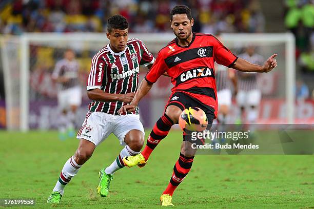 Kenedy of Fluminense struggles for the ball with Joao Paulo of Flamengo during a match between Fluminense and Flamengo as part of Brazilian...