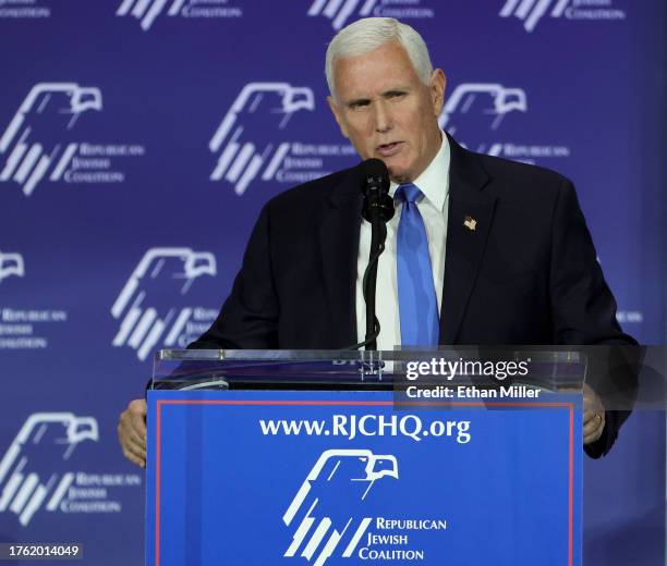 Republican presidential candidate former U.S. Vice President Mike Pence speaks after suspending his campaign for president during the Republican...