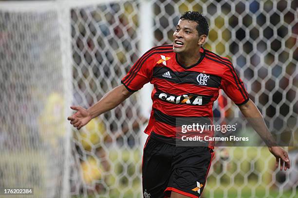 Andre Santos of Flamengo celebrates a scored goal during a match between Flamengo and Fluminense as part of the Brazilian Championship Serie A 2013...