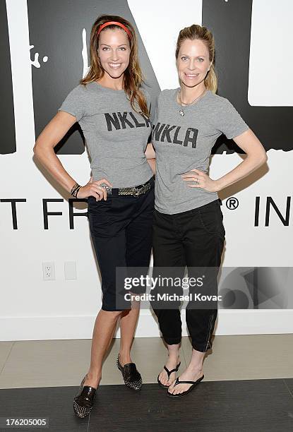 Actresses Tricia Helfer and Kristin Bauer van Straten attend the NKLA Pet Adoption Center ribbon cutting and celebrity/donor brunch at the NKLA Pet...