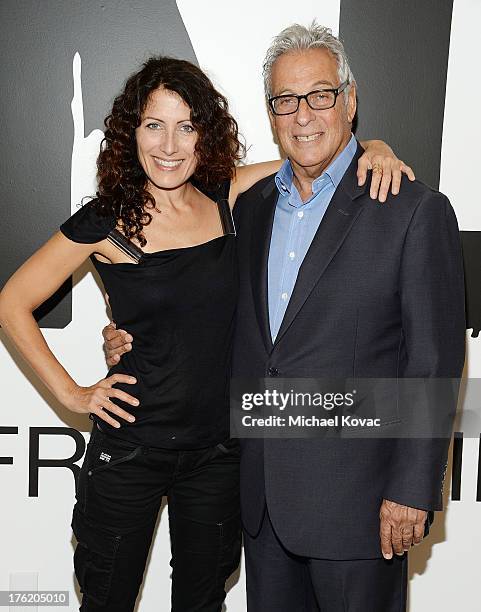 Actress Lisa Edelstein and producer Hawk Koch attend the NKLA Pet Adoption Center Opening Celebration at the NKLA Pet Adoption Center on August 11,...