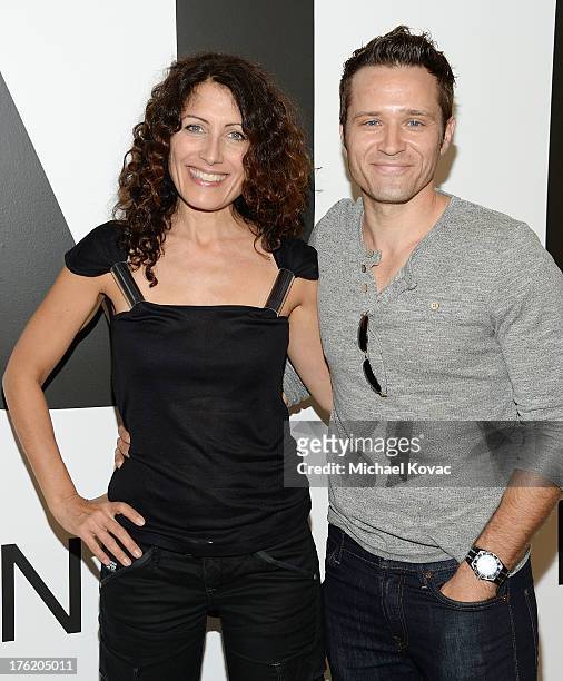 Actress Lisa Edelstein and actor Seamus Dever attend the NKLA Pet Adoption Center Opening Celebration at the NKLA Pet Adoption Center on August 11,...