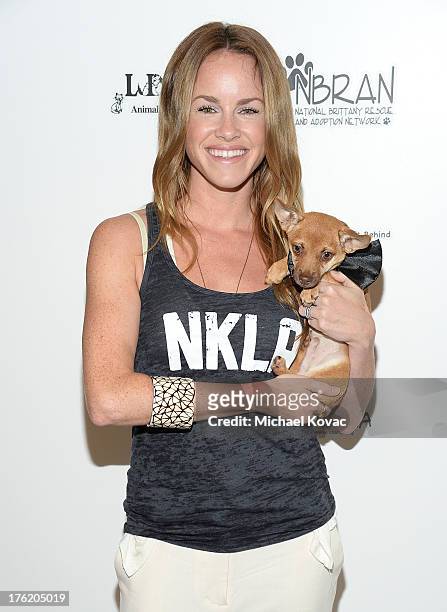 Actress Julie Marie Berman attends the NKLA Pet Adoption Center Opening Celebration at the NKLA Pet Adoption Center on August 11, 2013 in Los...