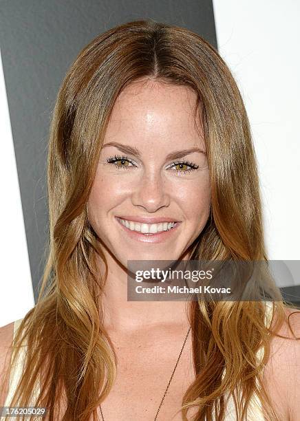 Actress Julie Marie Berman attends the NKLA Pet Adoption Center Opening Celebration at the NKLA Pet Adoption Center on August 11, 2013 in Los...