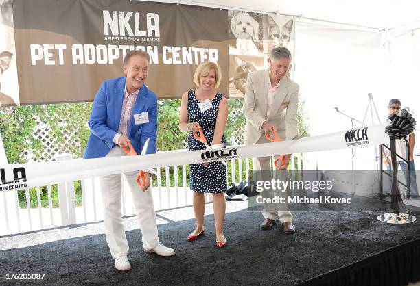 Real estate developer Ron Gershman, Catherine Gershman, and Best Friends Animal Society CEO Gregory Castle cut the ribbon to official open the NKLA...