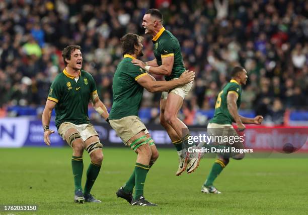 Jesse Kriel of South Africa celebrates with Eben Etzebeth following the team’s victory during the Rugby World Cup Final match between New Zealand and...