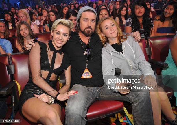 Actress/musician Miley Cyrus, musician Billy Ray Cyrus, and actress Noah Cyrus attend the 2013 Teen Choice Awards at Gibson Amphitheatre on August...