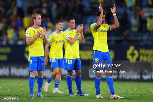 Alex Fernandez and Chris Ramos of Cadiz CF applaud the fans following the LaLiga EA Sports match between Cadiz CF and Sevilla FC at Estadio Nuevo...