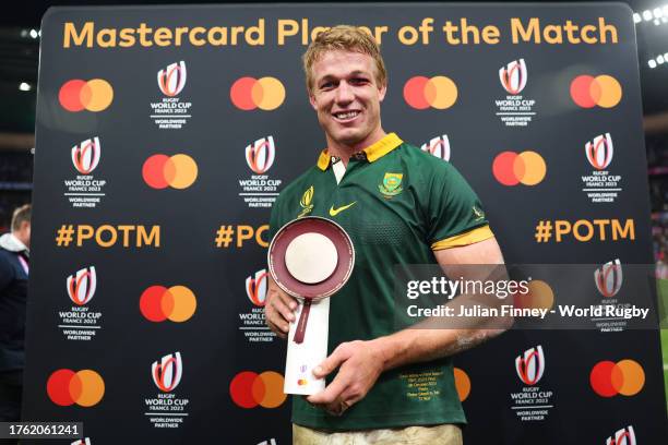 The MASTERCARD Player of the Match, Pieter-Steph Du Toit of South Africa, is presented with a Trophy after the Rugby World Cup Final match between...