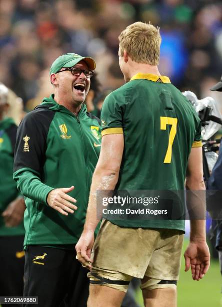 Jacques Nienaber, Head Coach of South Africa, celebrates with Pieter-Steph Du Toit following the team's victory during the Rugby World Cup Final...