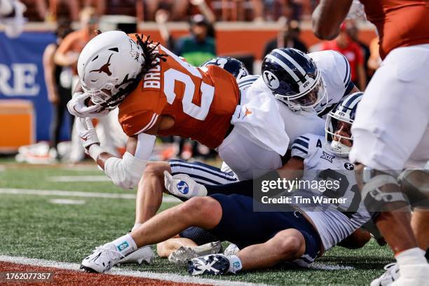 Jonathon Brooks of the Texas Longhorns dives across the goal line for a touchdown in the first half against the Brigham Young Cougars at Darrell K...