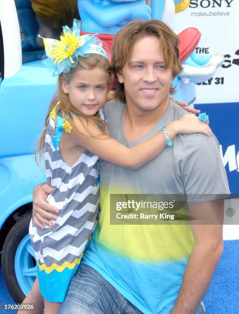 Dannielynn Birkhead and father Larry Birkhead arrive at the Los Angeles Premiere 'Smurfs 2' on July 28, 2013 at Regency Village Theatre in Westwood,...