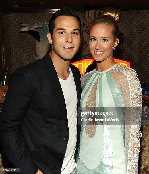 Actor Skylar Astin and actress Anna Camp pose in the green room at the 2013 Teen Choice Awards at Gibson Amphitheatre on August 11, 2013 in Universal...