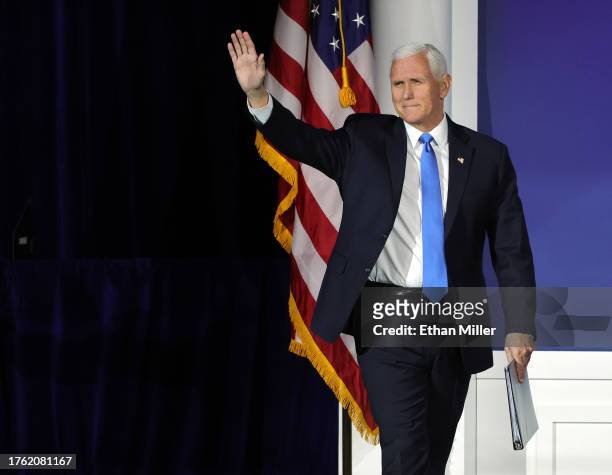 Republican presidential candidate former U.S. Vice President Mike Pence arrives at the Republican Jewish Coalition's Annual Leadership Summit at The...