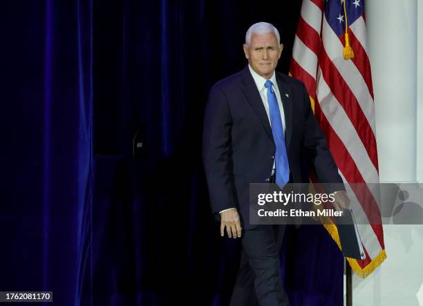 Republican presidential candidate former U.S. Vice President Mike Pence arrives at the Republican Jewish Coalition's Annual Leadership Summit at The...